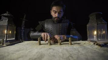 The commander who advances the chess pieces on the map. video