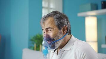 Man with lung disease having difficulty breathing. Connected to respirator. video