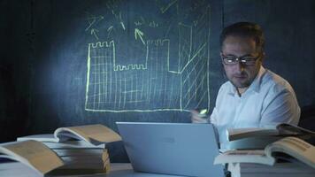 Historian man drawing historical castle on blackboard. video