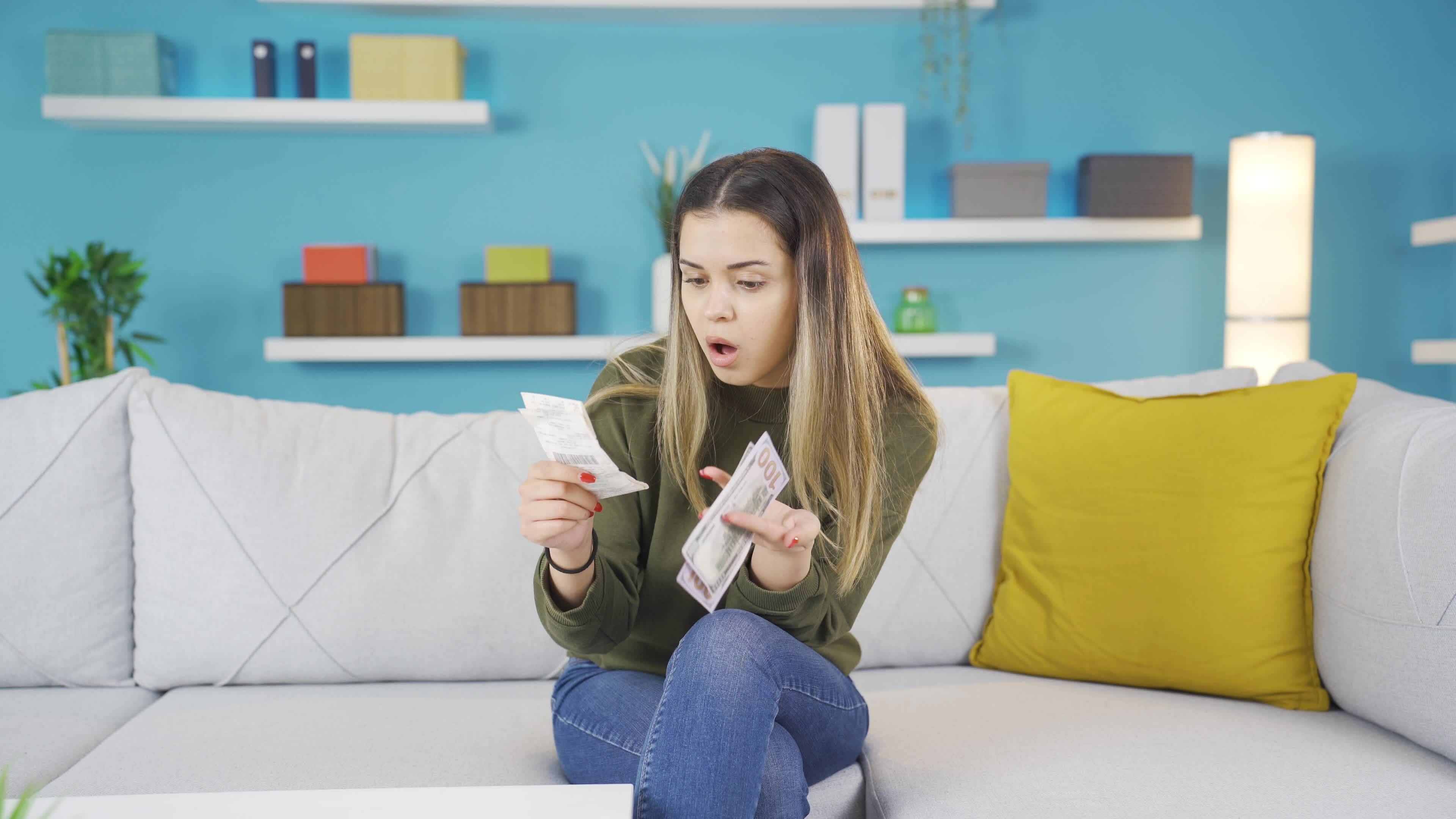 Young woman complaining about high bills. 32425155 Stock Video at Vecteezy