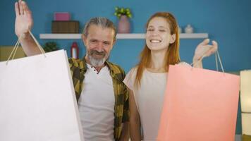 Father and daughter shopping online. video