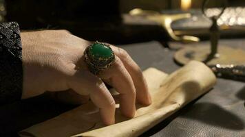 Putting a ring on a finger in ancient times. Close-up. video