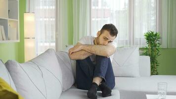 Depressed young man thinking sad and sad at home video