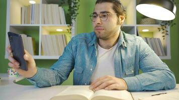 The male student, who studies until late, falls asleep. video