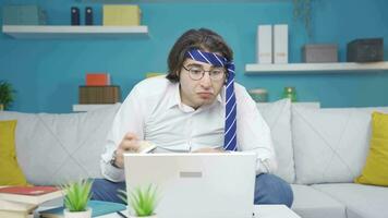 Funny but smart guy playing with a brain teaser. video