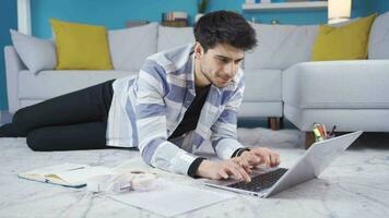 Young Freelancer Portrait. Young man working with laptop. video