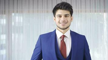 Portrait of handsome and dashing successful young entrepreneur. video