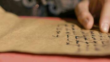 Words written with pen on paper in historical setting. video