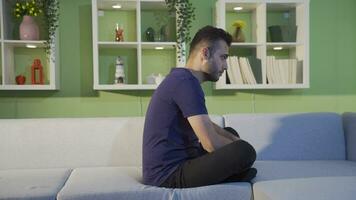 The mentally exhausted young man is depressed and helpless. video