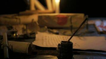 Writing with historical period items by candlelight. video