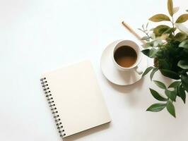 plano laico de espacio de trabajo escritorio con blanco papel, café y planta en mesa fondo, ai generado foto