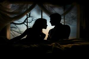 Silhouette of couple in bed at night time. Generate Ai photo