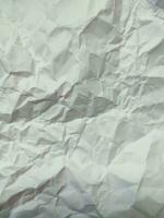 Crumpled white paper texture, pattern, background photo