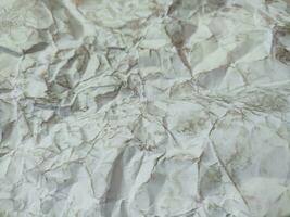 Crumpled white paper texture, pattern, background photo