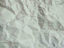 Crumpled white paper texture, pattern, background photo