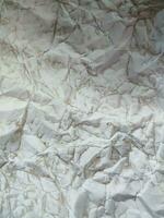 Crumpled white paper texture, pattern, background photo