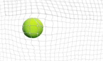 tennis ball into the net Isolated on a white background photo