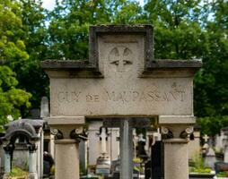 Maupassant's Tomb, Montparnasse Cemetery, Paris, France photo