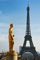 Eiffel Tower and Statue Parisian Majesty photo