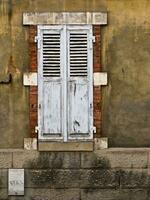 Old French Building with Closed Shutters, Savoie, France photo