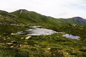 Serene Alpine Lake amidst Savoie Mountains   Saint Sorlin d'Arves Landscape photo