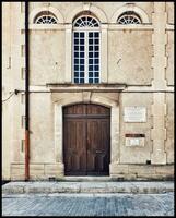 Timeless Beauty Ancient Architecture of an Old Building in Daylight photo