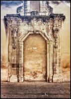 Ancient Stone Building with Sealed Stone Door photo