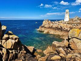 Serene Lighthouse on Brehat Island, Bretagne, France photo