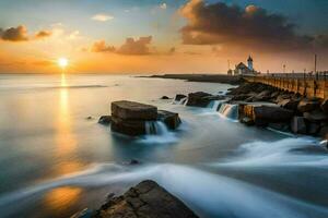 the sun sets over the ocean and rocks in front of a lighthouse. AI-Generated photo