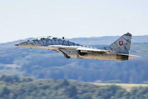 Military fighter jet plane at air base. Air force flight operation. Aviation and aircraft. Air defense. Military industry. Fly and flying. photo