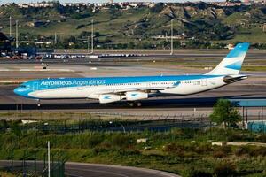 Aerolineas Argentinas passenger plane at airport. Schedule flight travel. Aviation and aircraft. Air transport. Global international transportation. Fly and flying. photo