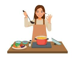 Young woman cooking delicious vegetable soup in the kitchen making okay gesture vector