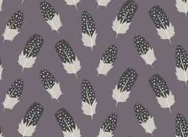 Seamless pattern with guinea fowl feathers. vector