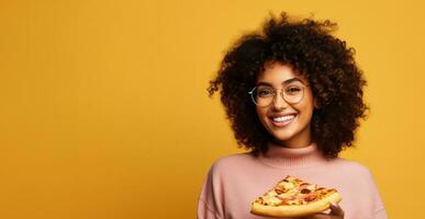 College student enjoying pizza during study break isolated on a cafeteria gradient background photo