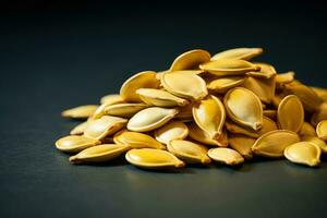 Macro photo of pumpkin seeds culinary use isolated on a gradient background