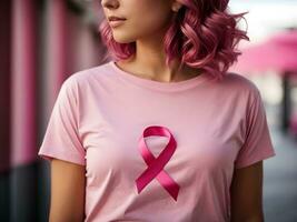 Breast Cancer Awareness Pink Ribbon on Shoulder of woman photo