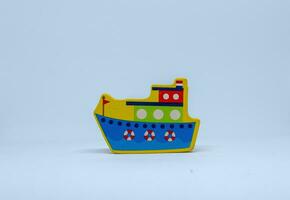 Yellow boat on a white background photo