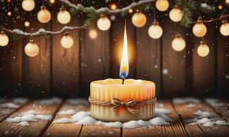 Burning candle Christmas decoration on wooden background photo