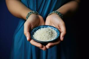 Female hands holding a bowl of rice. Generative AI photo