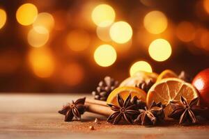 Traditional Christmas spices and dried orange slices on holiday light background. Christmas spices decoration photo