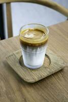 Dirty coffee on wooden table, stock photo