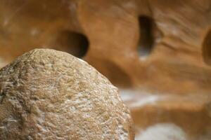 Brown sand-colored stone tiles on the wall photo