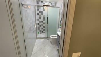 Interior of a modern bathroom with shower and toilet. Nobody inside photo