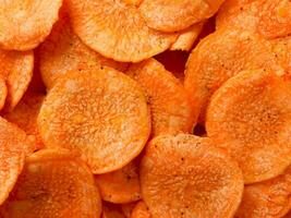 background of fried carrot slices photo