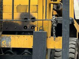 old rusty Forklift on the street photo