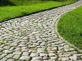 cobblestone path in the park photo