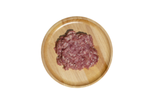 Raw fresh minced pork on a wooden plate on transparent background, Top view png