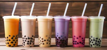 Plastic cups of different tasty bubble tea on wooden background. Generative AI photo