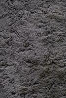 Fluffy carpet surface. Soft rug material close up. photo