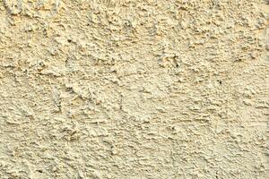 Rugged grungy plaster wall texture. photo